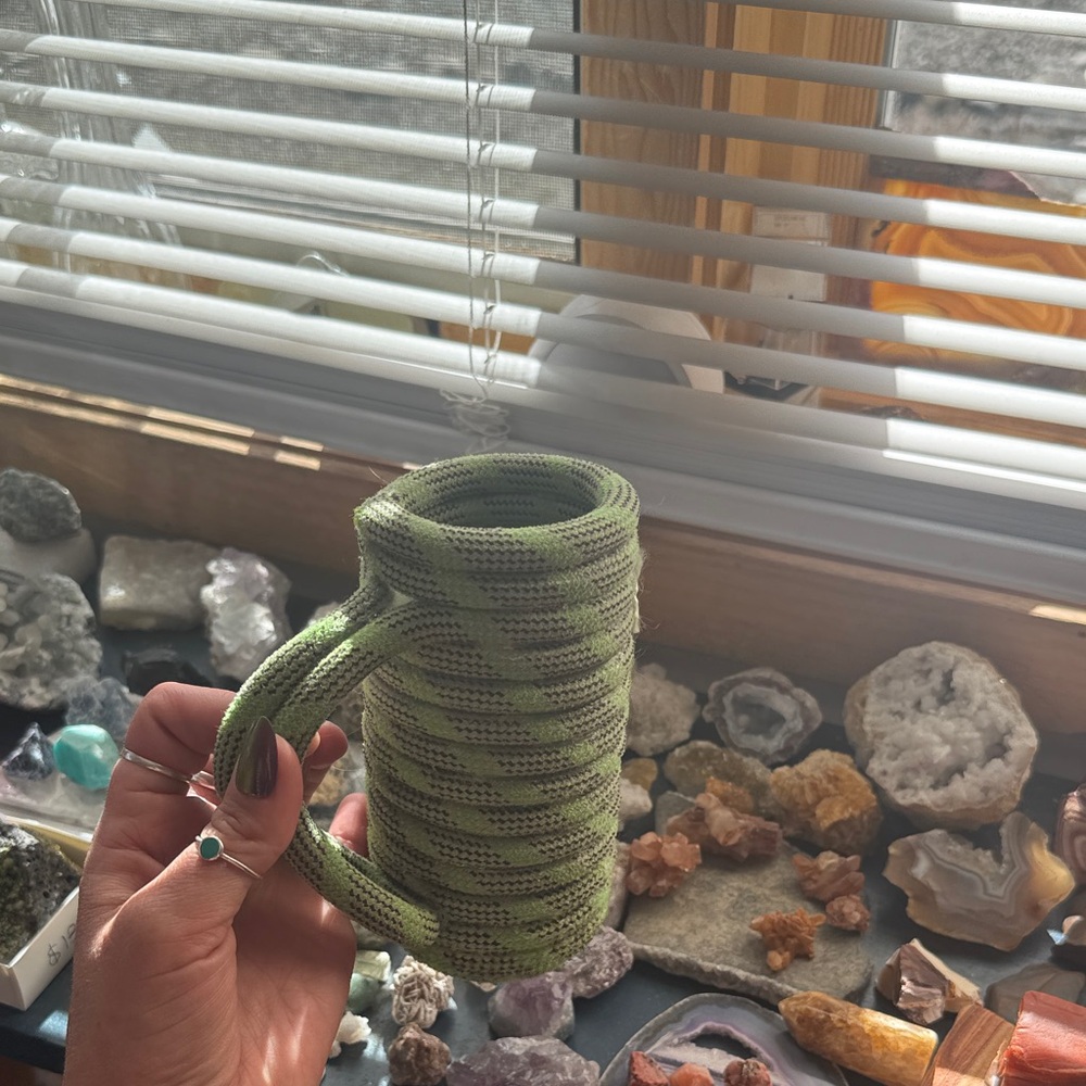 Green retired climbing rope coozie